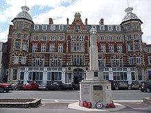 The Royal Hotel with the U.S. Forces World War II Memorial in the foreground. Royal Hotel and War Memorial at Weymouth Dorset.jpg