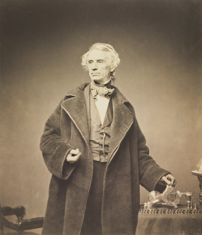 Morse with his recorder. Photograph taken by Mathew Brady in 1857. Samuel Morse with his Recorder by Brady, 1857.png