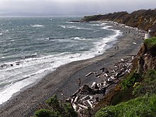 Spiral Beach with Finlayson Point (distant) on the Strait of Juan de Fuca (Salish Sea)/Dallas Road waterfront. Scene at Clover Point Park - Victoria - BC - Canada - 04 (8564421474).jpg