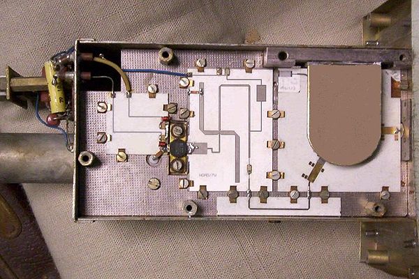 An RF power amplifier incorporating planar circuit structures. The amplifier on the left feeds its output into a set of planar transmission line filte