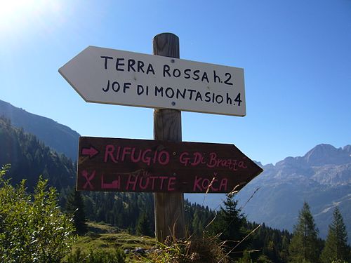 Signs in Italian, German and Slovenian on the Altopiano del Montasio.