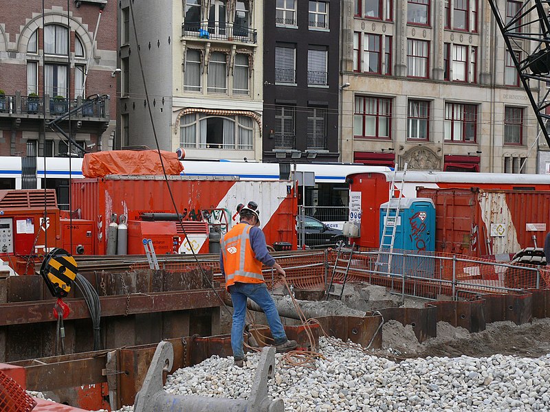 File:Traffic navigation at the Rokin with a passing tram in the background and a sheet pile excavation in the foreground; free photo of Amsterdam city by Fons Heijnsbroek, 2007.jpg