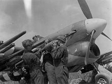 A Hawker Typhoon is armed with air-to-ground missiles, May 1944 Typhoon-rearmed.jpg