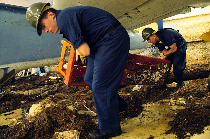 File:US Navy 080921-N-5758H-529 viation Maintenance Administrationman 3rd Class Tyler Coughlin, left, and Aviation Support Equipment Technician Francisco Deluna move a bench at the Lone Star Flight Museum in Galveston.jpg