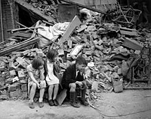 Children of an eastern suburb of London, made homeless by the Blitz WWII London Blitz East London.jpg