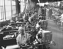 In WWII, the Washington Navy Yard & Naval Gun Factory employed women in large numbers for trade and craft jobs for the first time. This image dated January 1, 1943, shows female lathe operators. Washington Navy Yard female lathe operators 1 Jan 1943.jpg