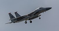 A US Air Force F-15C Eagle, tail number 83-0010, on final approach at Kadena Air Base in Okinawa, Japan. The aircraft is assigned to the 67th Fighter Squadron.