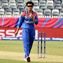 Thailand's Nattaya Boochatham (along with Uganda's Concy Aweko) holds the records for the most wickets in one calendar year. 2020 ICC W T20 WC WI v T 02-22 Boochatham (02).jpg