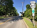 File:2022-06-05 18 51 14 View east along Pennsylvania State Route 317 (East Poland Avenue) at Main Street in Bessemer, Lawrence County, Pennsylvania.jpg