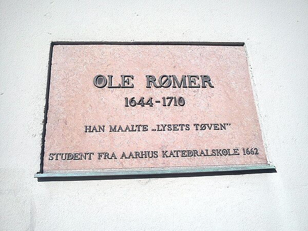 A relief in memory of Ole Rømer, graduate of 1662.