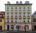 Wohnhaus mit Ladeneinbau, in geschlossener Bebauung