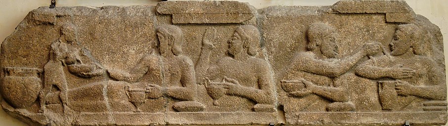 Symposium scene, c. 575-500 BC, Assos Banquet Assos Louvre Ma2829.jpg