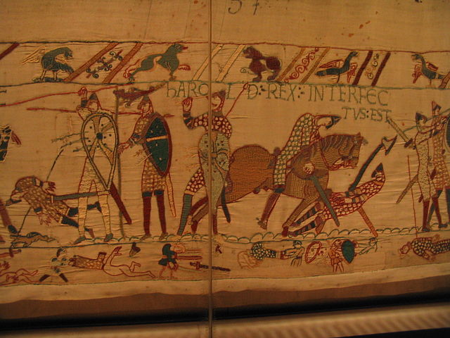 The Bayeux Tapestry, depicting the death of Harold II, 14 October 1066. His "Wyvern Standard" can be clearly seen at the left side.