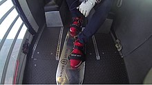 Both feet in the bindings and ready to exit the aircraft Board on ready to go.jpg