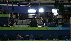 Bob Costas of NBC Sports reads from the teleprompter at 2008 Beijing Olympics.jpg