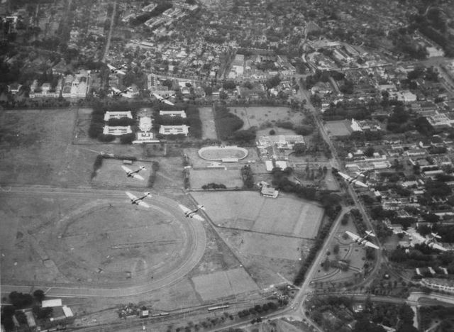 Royal Dutch East Indies Army bomber planes fly over Batavia Koningsplein in the 1930s.