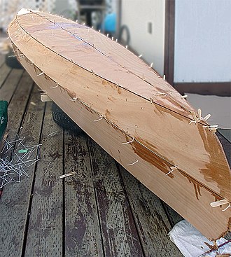 A stitched canoe hull under construction. Canoe stitch and glue.jpg