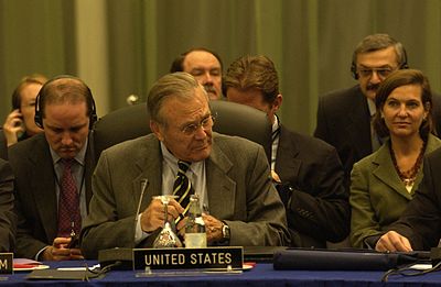 Rumsfeld and Victoria Nuland at the NATO-Ukraine consultations in Vilnius, Lithuania, on October 24, 2005.