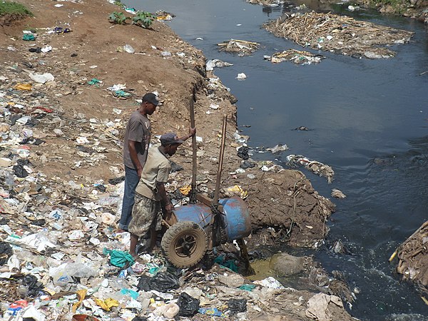 Example of lacking fecal sludge management: Fecal sludge collected from pit latrines is dumped into a river at the Korogocho slum in Nairobi, Kenya.