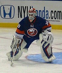 Roloson in goal for the Islanders during their 2009 home-opener. Dwayne Roloson.jpg