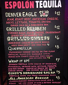 Menu displaying text of food and prices at Denver eagle.
