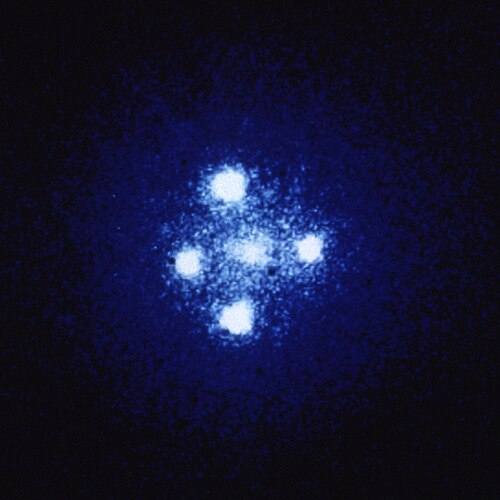 Einstein cross: four images of the same astronomical object, produced by a gravitational lens