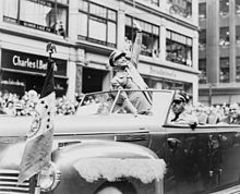 Dwight Eisenhower waves to crowd in 1945 Eisenhower parade NYWTS.jpg