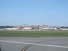 Main passenger terminal seen from runway 6/24