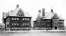 The first Norwood High School building (right) opened in 1897 beside the Allison Elementary School (left) on Allison Street. The Victorian Gothic Revival building is believed to have been designed by famed Cincinnati architect Samuel Hannaford. It was destroyed by fire in 1917, but the elementary school building still stands today. First Norwood High School Building Right Along Allison Elementary School Left Allison Avenue Norwood Ohio 1897.jpg