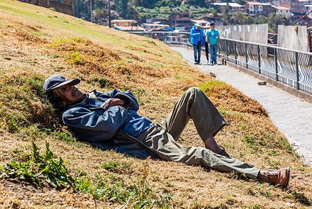 Man napping in San Cristobal, Peru