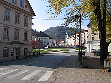 An emerging phenomenon dubbed the public sphere emerged in Europe, a space between government authority and private life, in which citizens could have rational-critical discussions in town squares like this one about government decisions, and form public opinion as a counterweight to authority. Idrija town square.jpg