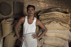 Grain street store handboy Varanasi Benares India