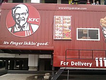 Fast food restaurant Kentucky Fried Chicken is heavily referenced in the episode. KFC Sargodha Pakistan.jpg