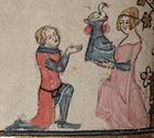 Un cavaliere medievale, in ginocchio davanti a una dama, ne riceve un elmo crestato da un cigno (miniatura fiamminga dal fol. 101v del Manoscritto Bodley 264).