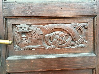 Motifs taken from folkloric tradition and national history (in the case of Norway Viking art) - Relief on a door of the History Museum in Oslo, Norway, designed by Henrik Bull (1902)