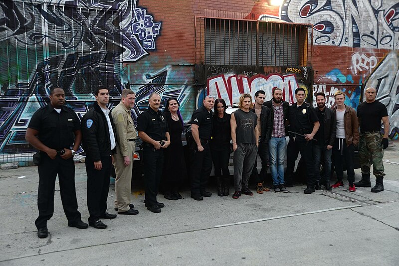 File:Lead actors with police officers.jpg