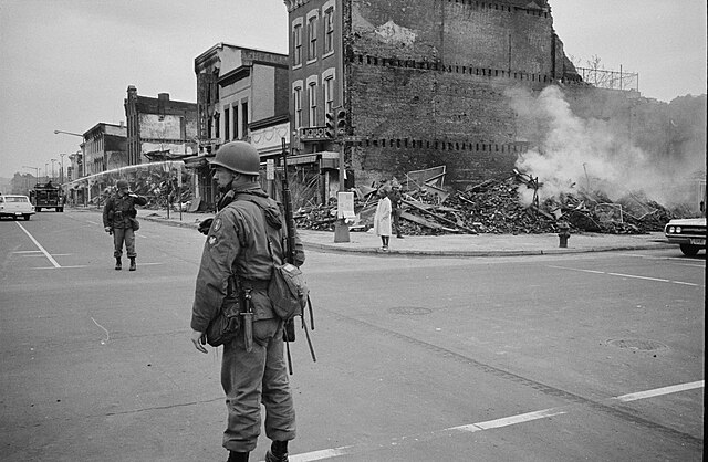 Soldiers stand near ruined buildings in Washington, D.C.