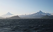 Shishaldin (left) and Isanotski volcanoes on Unimak Island.