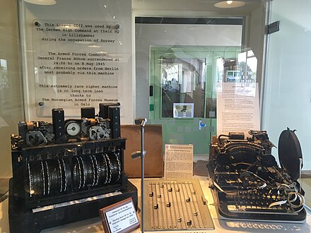 German Lorenz SZ42 teleprinter attachment (left) and Lorenz military teleprinter (right) at The National Museum of Computing on Bletchley Park, England