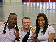 Booker T with his wife Sharmell in 2009 Pat avec Booker T & Sharmel (3432242329).jpg