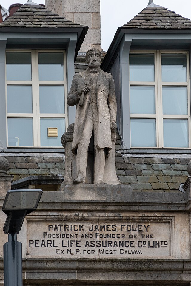 A statue of Foley on top of the Pearl Assurance building on The Headrow, Leeds