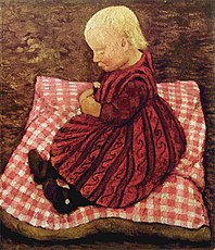 Elsbeth Modersohn on a red pillow (c. 1904)