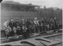 Women rivet heaters, with their tongs and catching buckets, Puget Sound Navy Yard, May 1919 Photograph of Women Rivet Heaters at Puget Sound Navy Yard, 05-29-1919 - NARA - 522877.tif