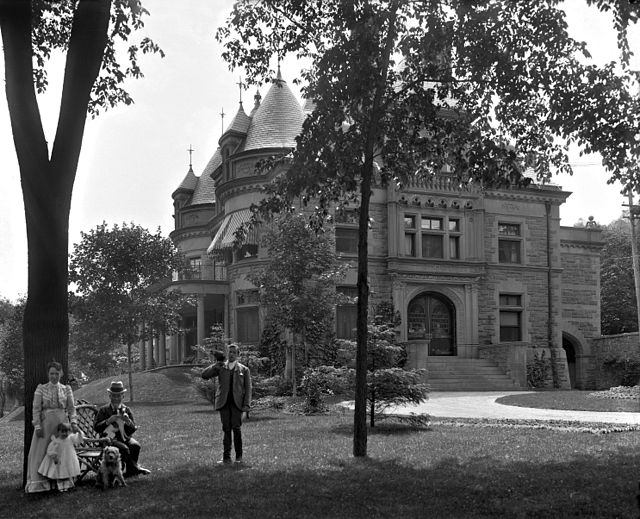 James Ross with his son, grandson and nurse outside his home at 3644 Peel Street in Montreal, c. 1910