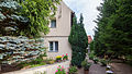 Residential stable house and barn of a two-sided courtyard