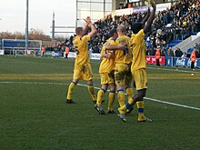 Southend players Southend Players taunt colchester fans.jpg