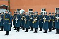 The band in their winter overcoats.