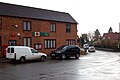 The post office in the centre of the village and, right, the village school