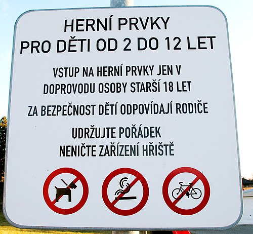 A Czech-language sign at the entrance to a children's playground