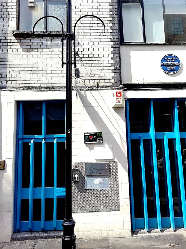 The former Trident Studios building at St Anne's Court, Soho, London, 2018, with the David Bowie Blue Plaque 51°30′52″N 0°08′03″W / 51.514318°N 0.1342